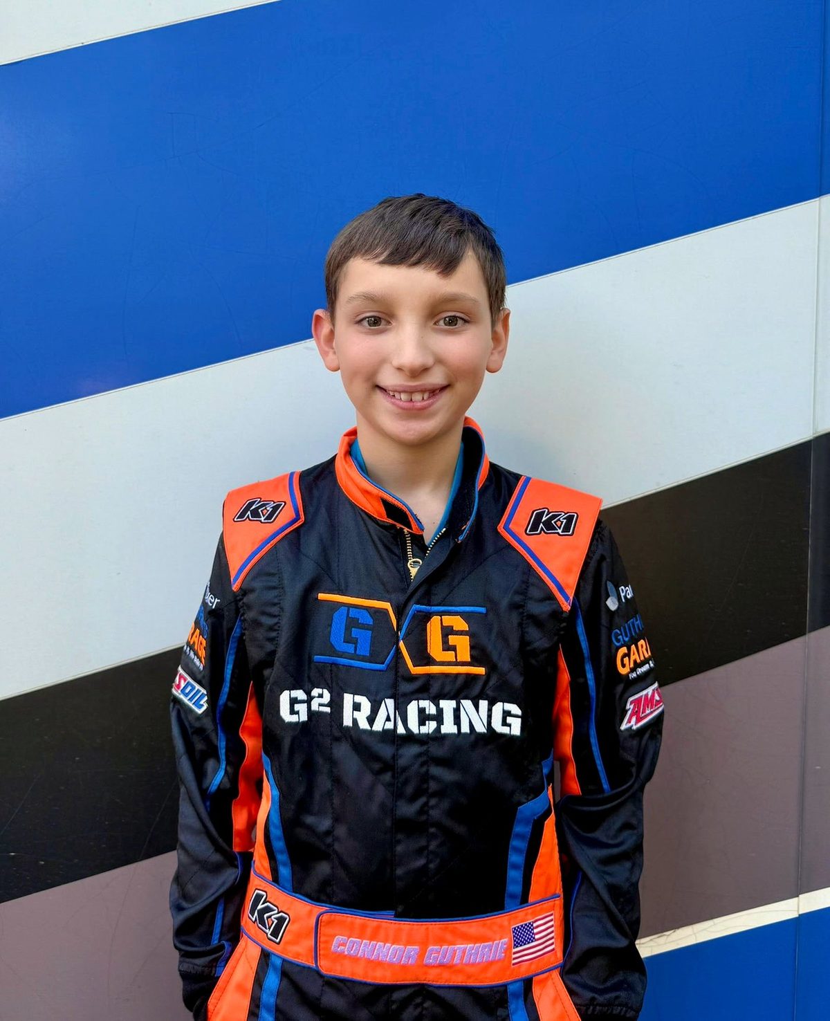 Connor Guthrie in his racing suit ahead of a race